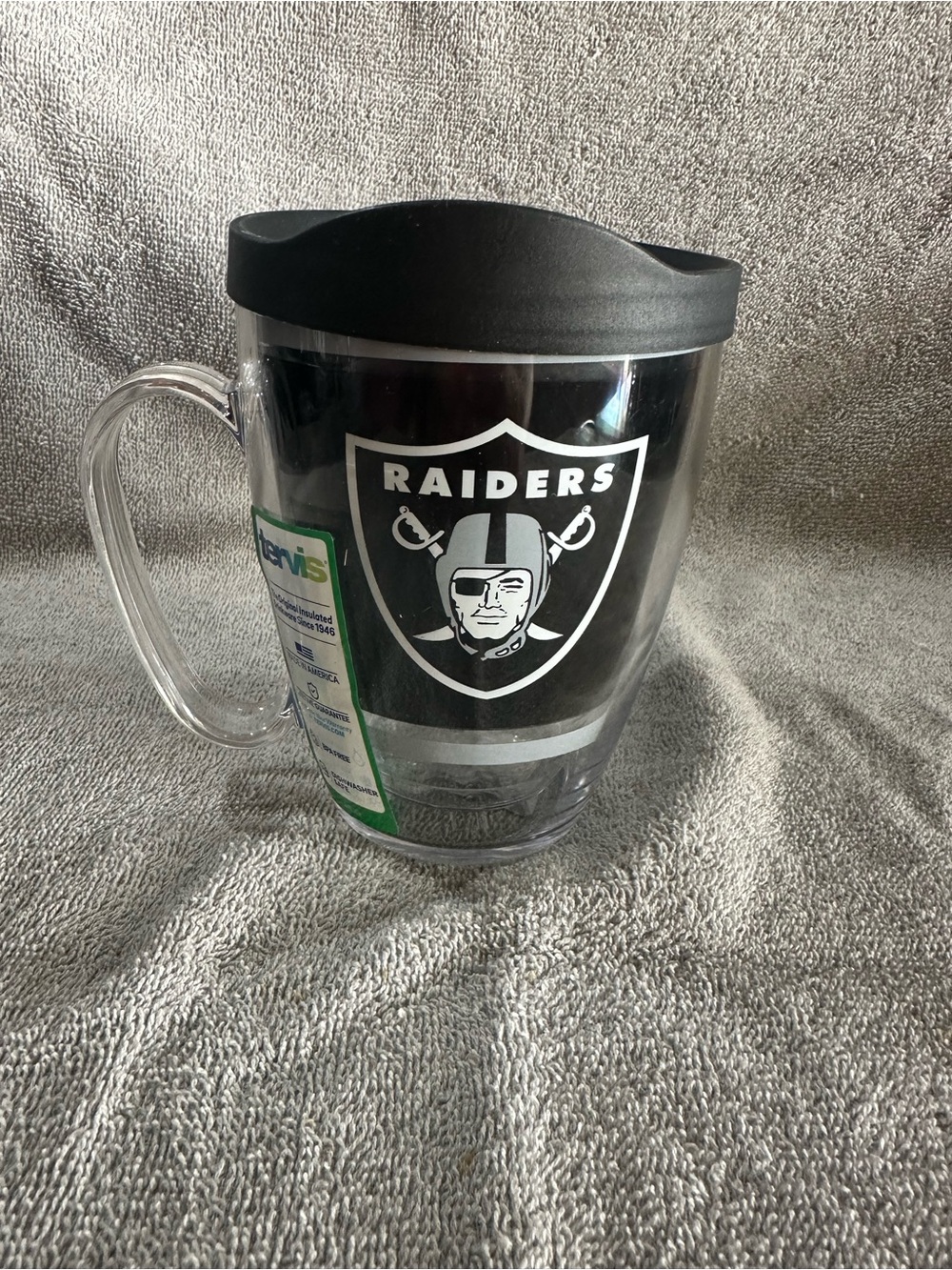 Riders by Lee Clear Travel Mug with Black Lid and Raiders Logo